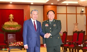 General Secretary To Lam Meets with China's Central Military Commission Vice Chairman - image 2