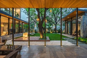 Neem Tree House: A C-Shaped Architectural Marvel in New Delhi - image 13
