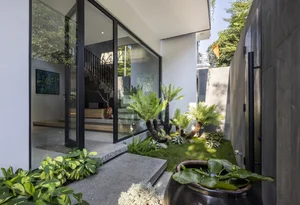 Innovative 3-Story West-Facing House Renovation with Lush Vertical Hanging Gardens in Viet Tri - image 3