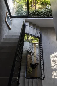 Innovative 3-Story West-Facing House Renovation with Lush Vertical Hanging Gardens in Viet Tri - image 6