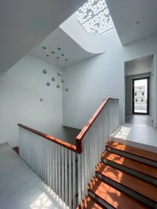 Innovative Void Designs and Staircases for Natural Light in Modern Homes - image 17