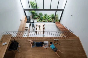 Innovative Void Designs and Staircases for Natural Light in Modern Homes - image 13
