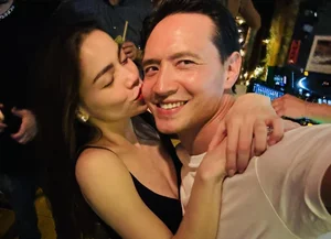 Actor Vinh Thuy Celebrates New Year 2024 with His Elegant Wife - image 3