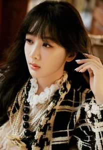 Yang Zi and Guan Xiaotong Stun Global Audiences at Paris Fashion Week - image 26