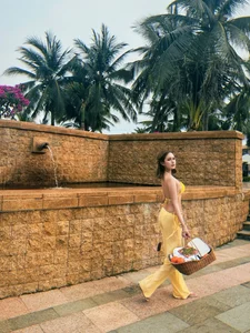 Influencer Xoai Non Stuns Fans in Vibrant Yellow Bikini Photoshoot - image 9