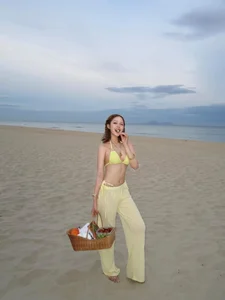 Influencer Xoai Non Stuns Fans in Vibrant Yellow Bikini Photoshoot - image 3