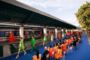 Fashion Extravaganza: Models Catwalk at Historic Saigon Railway Station - image 3