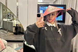 Mai Davika Embraces Vietnamese Culture with Conical Hat - image 9