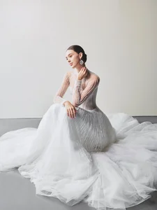 Dianka Zakhidova Captivates in a Sheer Wedding Gown for Bui Tien Dung Marriage - image 2