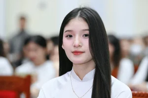 Pure Elegance: Hue Student Captivates Audiences in Miss Vietnam Pageant Gallery - image 1