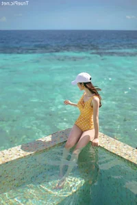 Jeong Hee Redefines Summer Elegance in Latest Monokini Shoot - image 25