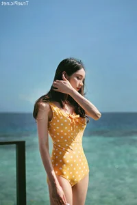 Jeong Hee Redefines Summer Elegance in Latest Monokini Shoot - image 20