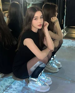 Russian Social Media Sensation Captivates Millions with Stunning Doll-Like Features and Fashion - image 0