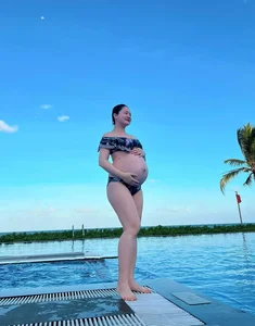 Vietnamese Celebrity Style and Life Updates: Winter Fashion and Heartwarming Family Moments - image 8