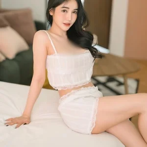 Doll-Like Beauty Embraces the Bold Underboob Fashion Trend in Stunning Photoshoot - image 1