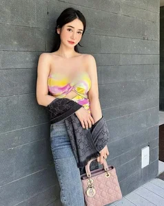 Doll-Like Beauty Embraces the Bold Underboob Fashion Trend in Stunning Photoshoot - image 5