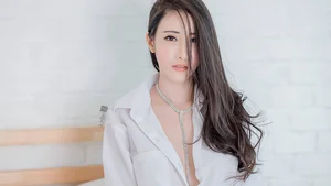 The Timeless Elegance of the Classic White Shirt: A Gallery of Sophisticated and Alluring Styles - image 15