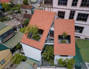 Stunning Townhouse Design: Traditional Red Tile Roofs Meet Lush Green Gardens in Urban Living - image 5