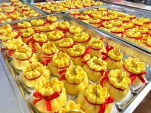Auspicious Gold Ingot Cakes and Money Bag Buns for Wealth Day - image 2