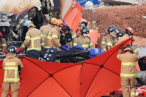 Investigation and Recovery: Scene of the Korean Aircraft Incident - image 6