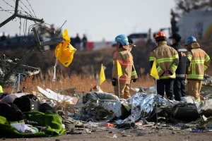 Investigation and Recovery: Scene of the Korean Aircraft Incident - image 3