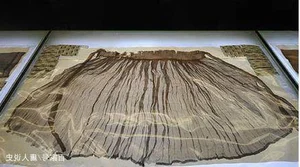 Ancient Tomb Discovery: Experts Unravel 354 Layers of Clothing - image 2