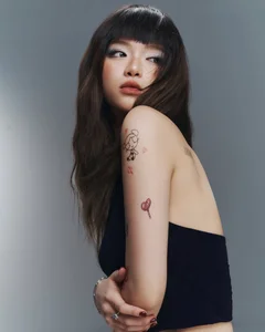 Linh Ka Showcases Personality with Chic Minimalist Tiny Tattoos - image 10