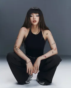 Linh Ka Showcases Personality with Chic Minimalist Tiny Tattoos - image 1