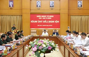 Vietnam Military Party Committee and Armed Forces Strive for Excellence in National Defense - image 2