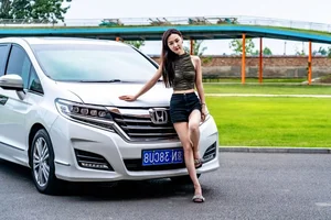 Stunning Chinese Model Poses with Classic Honda Motorcycle - image 3