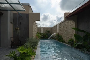 Innovative Two-Story Home Design Featuring a 'House Within a House' Concept - image 0