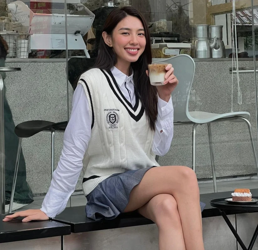 Miss Grand International Thùy Tiên Redefines Youthful Elegance in a Classic White Shirt Look