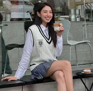 Miss Grand International Thùy Tiên Redefines Youthful Elegance in a Classic White Shirt Look - image 0