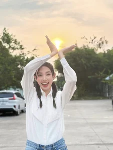 Miss Grand International Thùy Tiên Redefines Youthful Elegance in a Classic White Shirt Look - image 9