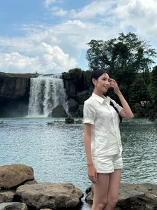 Miss Grand International Thùy Tiên Redefines Youthful Elegance in a Classic White Shirt Look - image 8