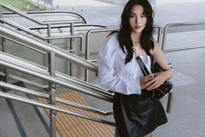 Miss Grand International Thùy Tiên Redefines Youthful Elegance in a Classic White Shirt Look - image 10