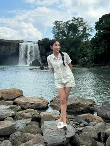 Miss Grand International Thùy Tiên Redefines Youthful Elegance in a Classic White Shirt Look - image 1