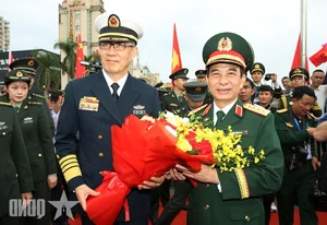 Vietnam and China Strengthen Bilateral Ties Through Border Defense Friendly Exchange - image 1