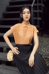 Summer Fashion Trends: Embracing the Vibrant Peach Fuzz and Orange Palette - image 3