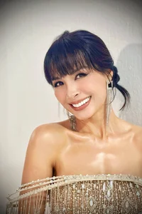 Former Supermodel Thuy Hanh Stuns in Backless Gown at Red Carpet Event - image 3