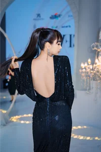 Former Supermodel Thuy Hanh Stuns in Backless Gown at Red Carpet Event - image 4