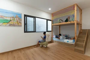 Modern 5x16m Bauhaus House in Hoc Mon with Bold Orange Accents - image 9