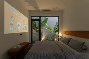 Modern 5x16m Bauhaus House in Hoc Mon with Bold Orange Accents - image 1