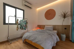 Modern 5x16m Bauhaus House in Hoc Mon with Bold Orange Accents - image 3