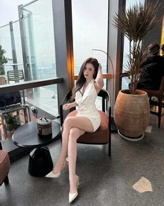 Popular TikToker Captivates Fans with Elegant Deep-Neck Dress and Unique Beauty Mark - image 6