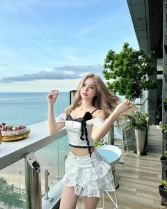 Popular TikToker Captivates Fans with Elegant Deep-Neck Dress and Unique Beauty Mark - image 5