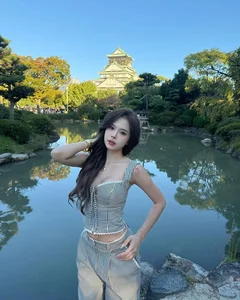 Popular TikToker Captivates Fans with Elegant Deep-Neck Dress and Unique Beauty Mark - image 10