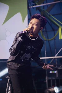 Erik Ignites the Stage at the High-Energy Summer Music Festival - image 1