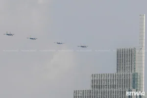 Aerial Spectacle: Fighter Jets and Helicopters Train Over Ho Chi Minh City - image 22