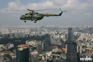 Aerial Spectacle: Fighter Jets and Helicopters Train Over Ho Chi Minh City - image 9